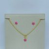 CONJUNTO INF. C RESINA BANHO DOURADO